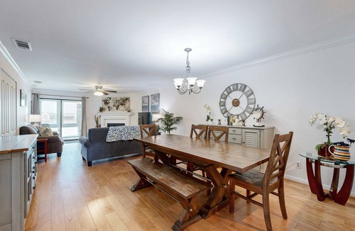 Folly Beach Condo | Elegant riverfront condo with access to private W/D, central AC, and pool access