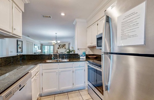 Folly Beach Condo | Elegant riverfront condo with access to private W/D, central AC, and pool access