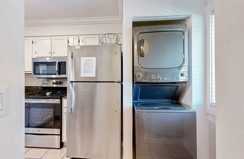 Folly Beach Condo | Elegant riverfront condo with access to private W/D, central AC, and pool access