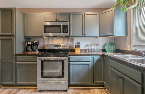 Terry Sanford House | "Escape to Ellis Hideaway: Cozy 2-Bedroom Retreat with 1.5 Baths