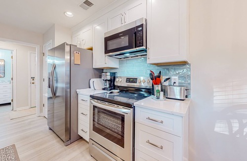 Sea Trail Condo | Ev's Escape: Sunroom, dog-friendly
