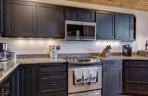 Mirror Lake House | Expansive screened deck, Gas fireplace, Gorgeous views, Firepit