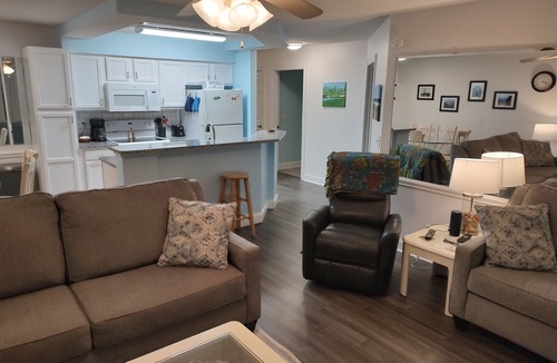 Sunset Beach Condo | Extra large first floor condo with indoor & outdoor pools, close to the beach.