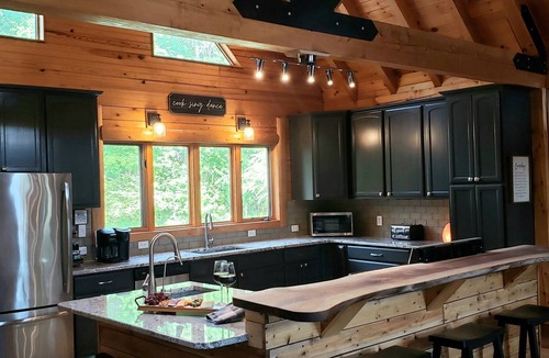 Bunnlevel Cabin | Families reconnect at Private Lakefront Log Cabin w/Hot Tub, Kayaks, Fishing!