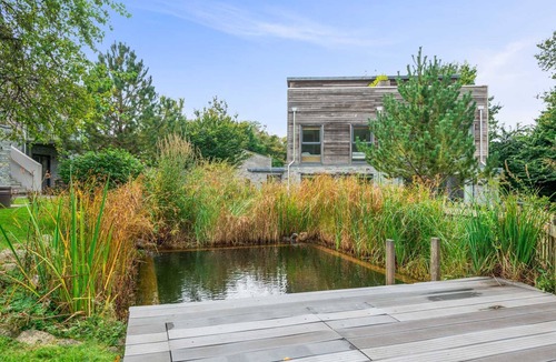 Talland House | Fantastic pet friendly property with large roof area, Charcoal BBQ, ideal for sunbathing and alfresc
