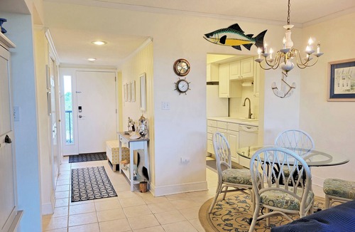 North Litchfield Beach Condo | Fourth Floor Condo across from Beach Access, Balcony, Pool, Grill Area, Elevator