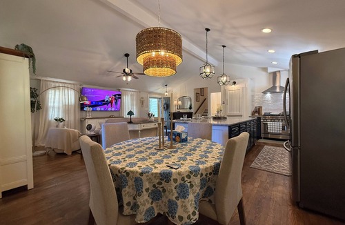 Raleigh House | French Country Retreat in North Hills, Fenced Yard, Game Room