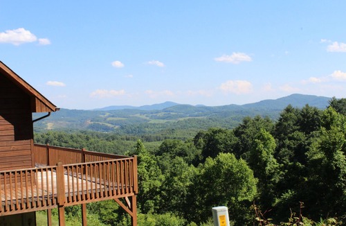 Grassy Creek Cabin | From Fireplace Evenings to Deckside Sunsets- Above It All Has It All