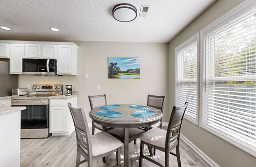 St. James Condo | Golf course view home with patio, close to ocean and beach access