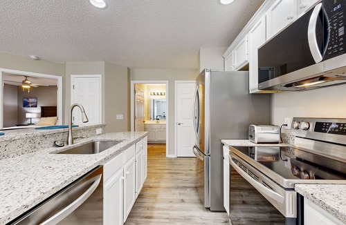 St. James Condo | Golf course view home with patio, close to ocean and beach access