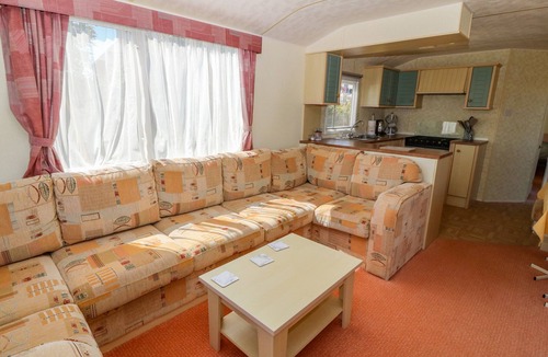 Cemaes Bay Cottage | GORPHWYSFA CARAVAN, pet friendly, with a garden in Cemaes Bay