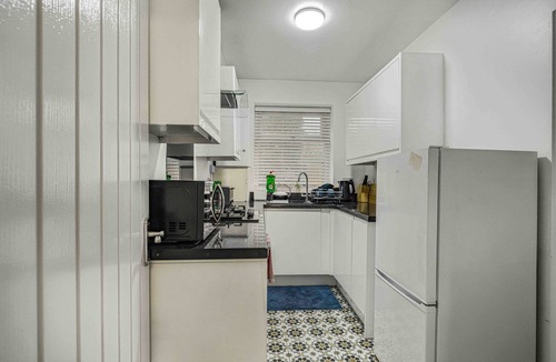Cheetham Hill House | GuestReady - Charming Retreat with Private Patio