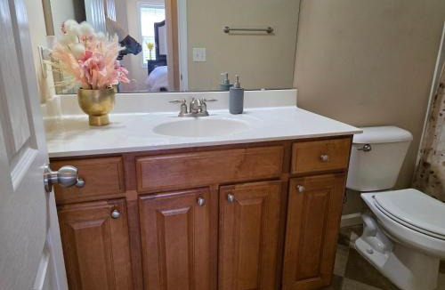 Northeast Raleigh House | Heaven on Earth - Large Bedroom with Private Bathroom
