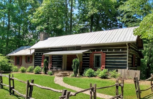 Robbinsville Cabin | Historic Log Cabin: Lake Front, Dock, Canoes, Private, Stylish