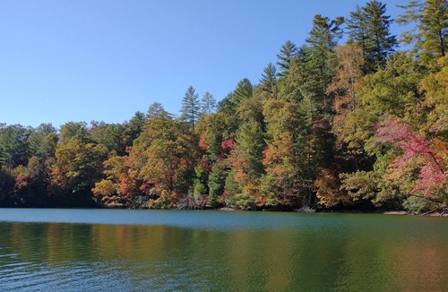 Robbinsville Cabin | Historic Log Cabin: Lake Front, Dock, Canoes, Private, Stylish