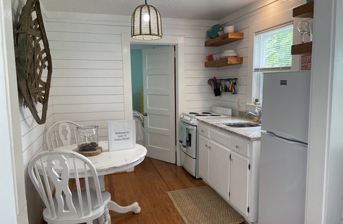 Morehead City Cottage | Historical guest house featured on HGTV's Beachfront Bargain Hunt Renovation!