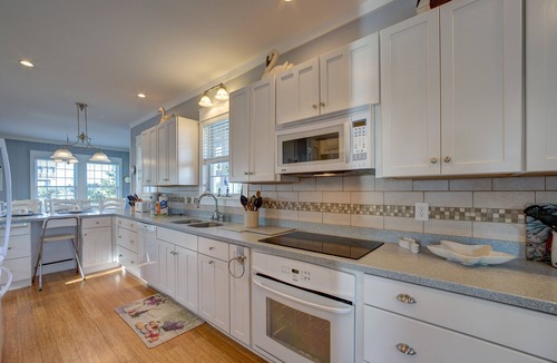 Brigands' Bay House | Huge, canal-front home w/private hot tub, WiFi, central AC, washer & dryer, dock