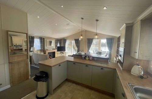 Tattershall Cabin | Indulgence Lakeside Lodge i1 is prime location with private fishing peg and hot tub at Tattershall