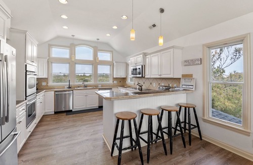 Pine Island House | Island Breeze: Heated Saltwater Pool | Rec Room