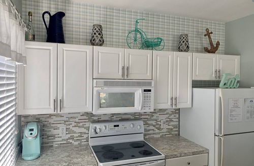 Sea Trail Condo | It's a beautiful time to visit! Golf course, 3rd floor, elevator, pet friendly!