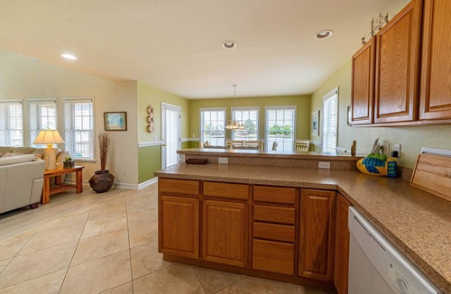 Colington Harbour House | K1552 BeachBumz- Canalfront! Community Pool! Private Dock!