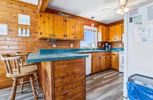 Kill Devil Hills House | KD1213- Oceanfront Charmer- 4 BRs, Hot Tub, Dog Friendly and Views!