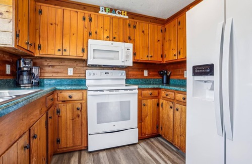 Kill Devil Hills House | KD1213- Oceanfront Charmer- 4 BRs, Hot Tub, Dog Friendly and Views!