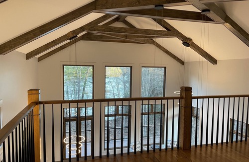 Nebo House | Lake front home with dock in a small cove with a beach.