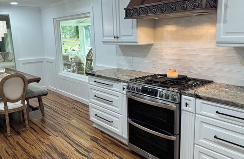 Terrell Cottage | LAKEFRONT GARDEN COTTAGE- beach, screened porch, dock, private, amazing views