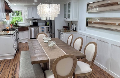 Terrell Cottage | LAKEFRONT GARDEN COTTAGE- beach, screened porch, dock, private, amazing views