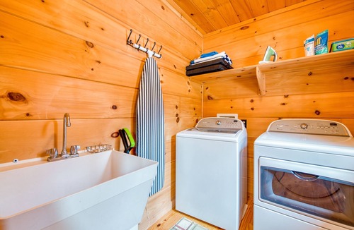 Mills River Cabin | Lakefront cabin & tiny home with a firepit, wet bar, washer/dryer, dock