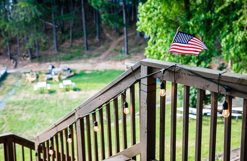 Steele Creek Cabin | Lakefront Property Two Bedroom Cabin #35 at Long Cove Resort by RedAwning