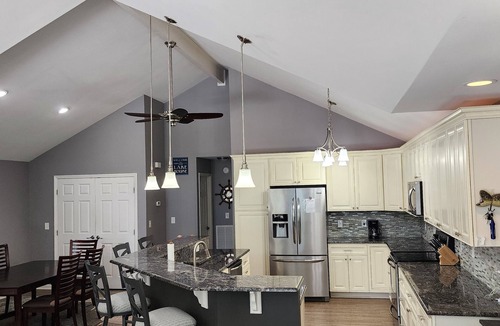 Littleton House | Lakefront single-story home, Flat lot! Huge game room!