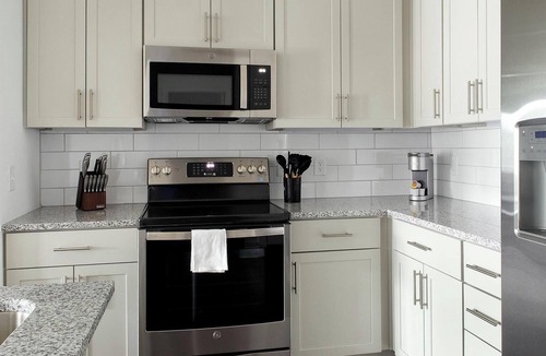 Southeast Raleigh Apartment | Landing | Chic 1BD, Yoga Studio, Gym