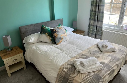 Whitland House | Large 17th Century farmhouse with inglenook fireplace and heated indoor pool