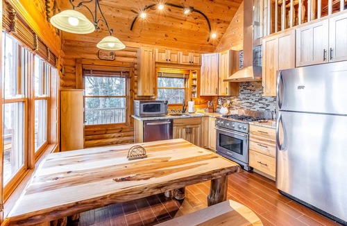 Sylva House | Log cabin with amazing mountain views, pool table, movie room & fireplace