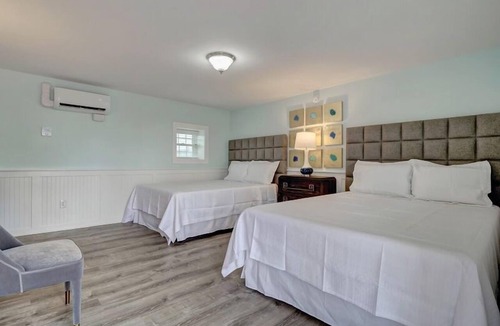 Surf City Hotel | Loggerhead Inn & Suites - Two Queen Room in hotel in Surf City, North Carolina
