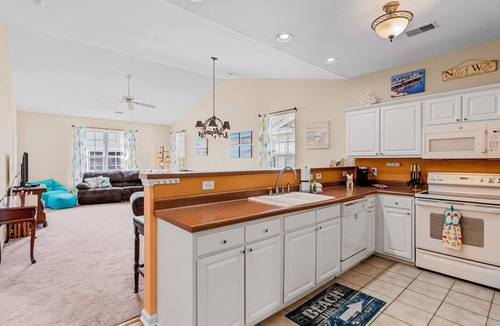 Sunset Beach Condo | Lovely condo with water view, balcony, full kitchen & W/D - dog-friendly