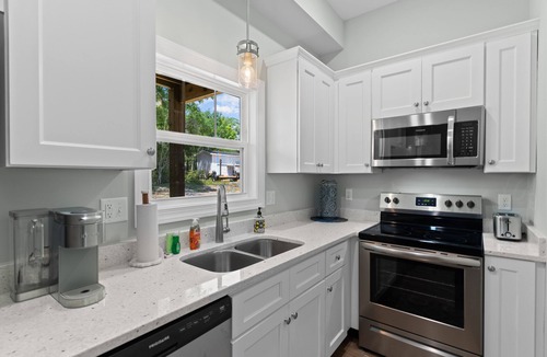 Supply House | Lower-level home with patio, grill, outdoor shower, streaming, central AC