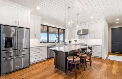 Laurel Park House | Luxe mountain-view retreat with private hot tub, covered deck, & chef's kitchen