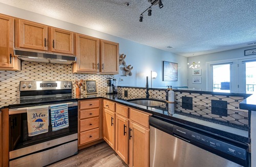 North Topsail Beach Condo | Luxurious Condo, Massage Chair, Arcade Games, Beautiful Pools, Hot Tubs, King bd