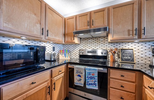 North Topsail Beach Condo | Luxurious Condo, Massage Chair, Arcade Games, Beautiful Pools, Hot Tubs, King bd
