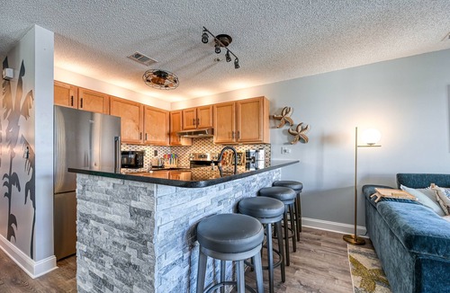 North Topsail Beach Condo | Luxurious Condo, Massage Chair, Arcade Games, Beautiful Pools, Hot Tubs, King bd