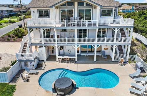 Carolina Dunes House | Luxurious home steps from beach with pool, hot tub, game room & fireplace