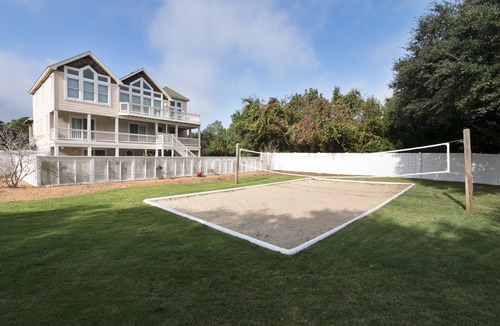 Duck House | Luxury 7 bedroom with private pool, volleyball court, WiFi, and keyless entry.