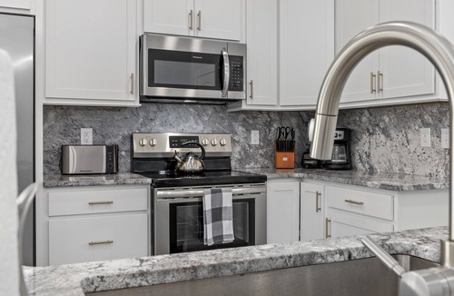 Ash House | Luxury Home Private Htd Pool w/WaterfallnBack Yard Oasis just Steps to Beach!