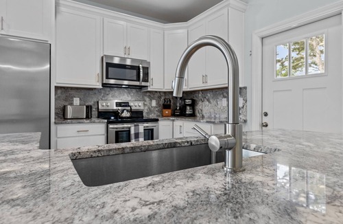 Ash House | Luxury Home Private Htd Pool w/WaterfallnBack Yard Oasis just Steps to Beach!
