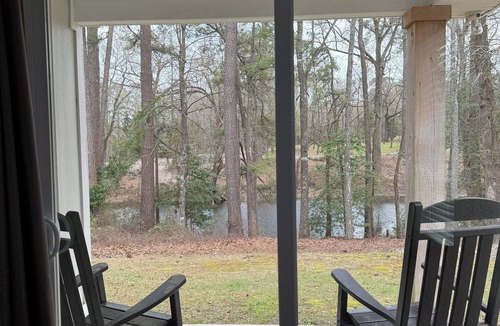Elizabethtown Resort | Luxury Lodging, Lakefront View, King Bed w/Private Bath, Private Patio.