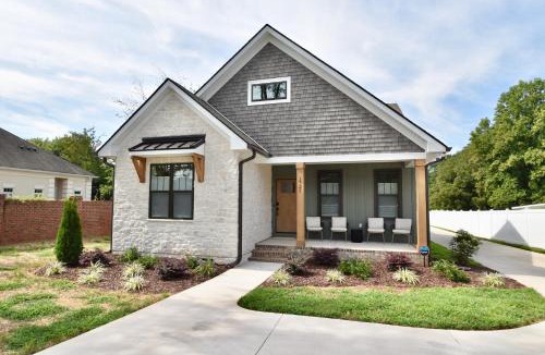 Gastonia House | Luxury New Construction Cottage with fireplace, office, and covered deck