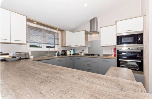 New Forest District Cabin | Meadowbank Lodge with ceiling surround system nr beach pet friendly Shorefields